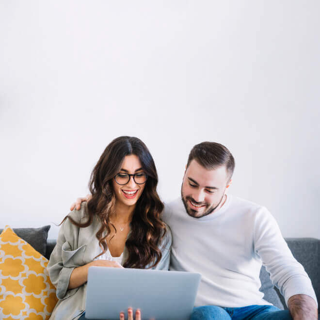 Photo of elderly couple using tablet